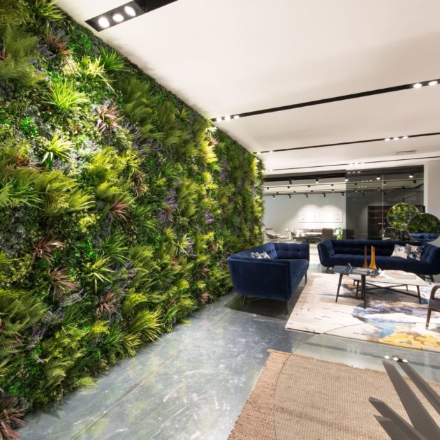 Office wall with artificial plant living wall panels