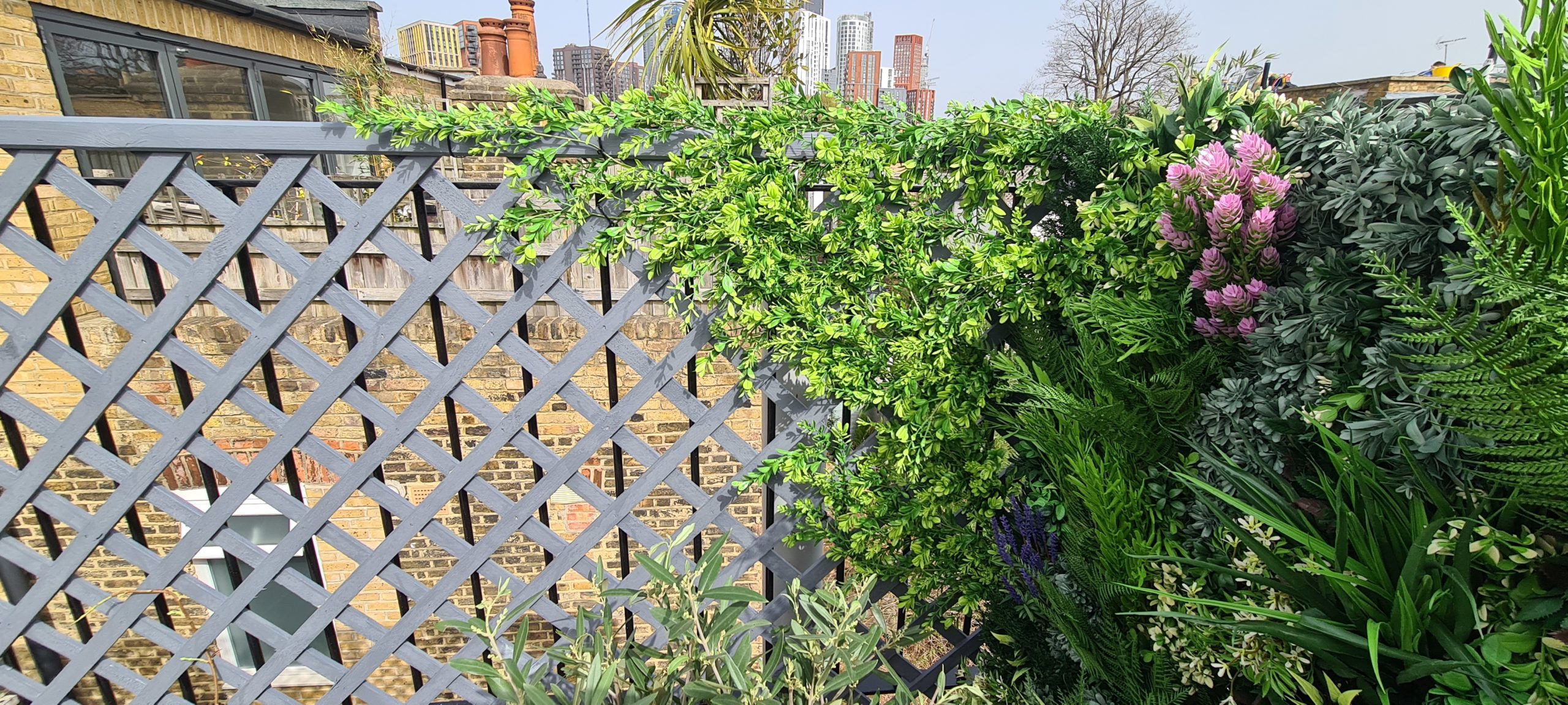 Close up of Vistafolia artificial plants on a London roof terrace
