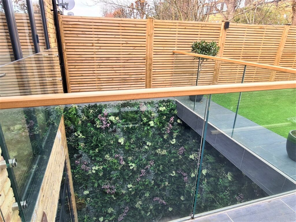 Garden View of an Artificial Green Wall in a London Lightwell