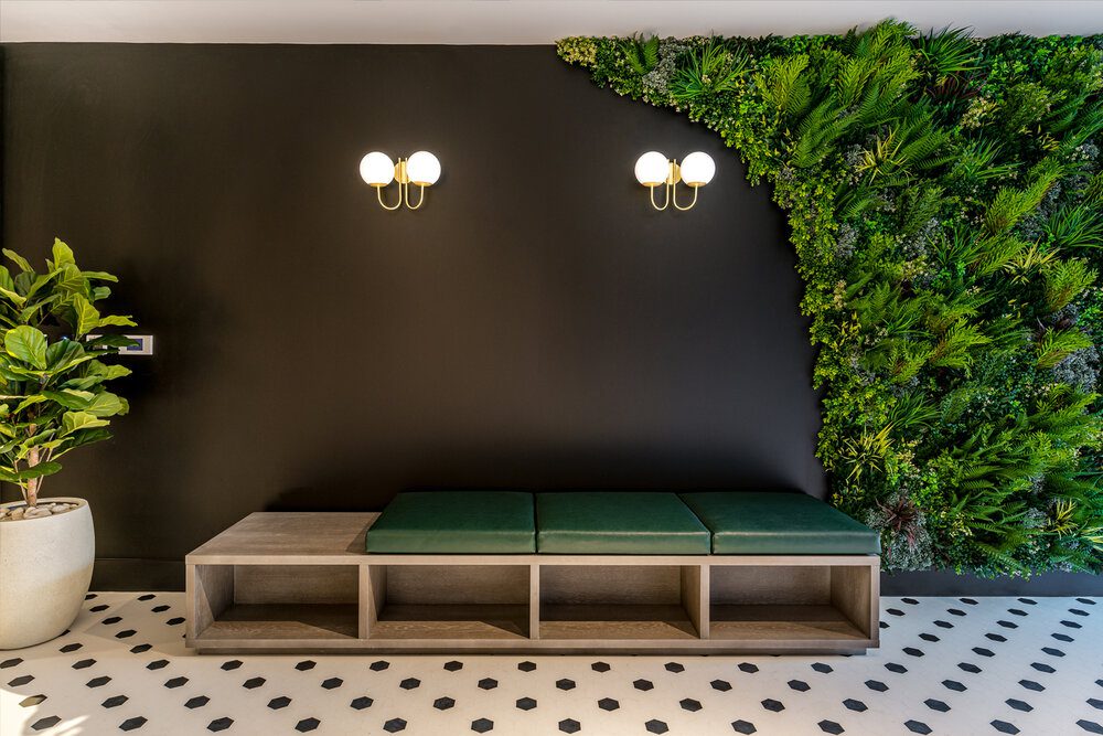 Artificial green wall in a lobby area in London