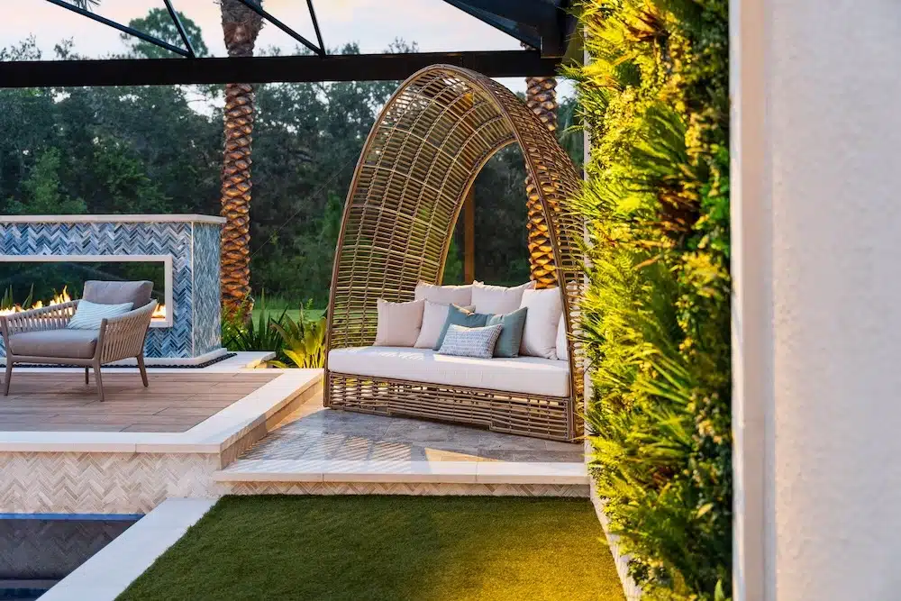 a fake ivy wall by a swimming pool in a garden in Florida