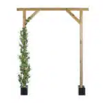 The Extendable Artificial Trailing Foliage archway features an extendable trellis on the left with lush greenery and white blossoms. Its supported by two square black planters, blending natural charm with enduring beauty.