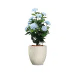 a realistic blue artificial hydrangea plant in a decorative pot