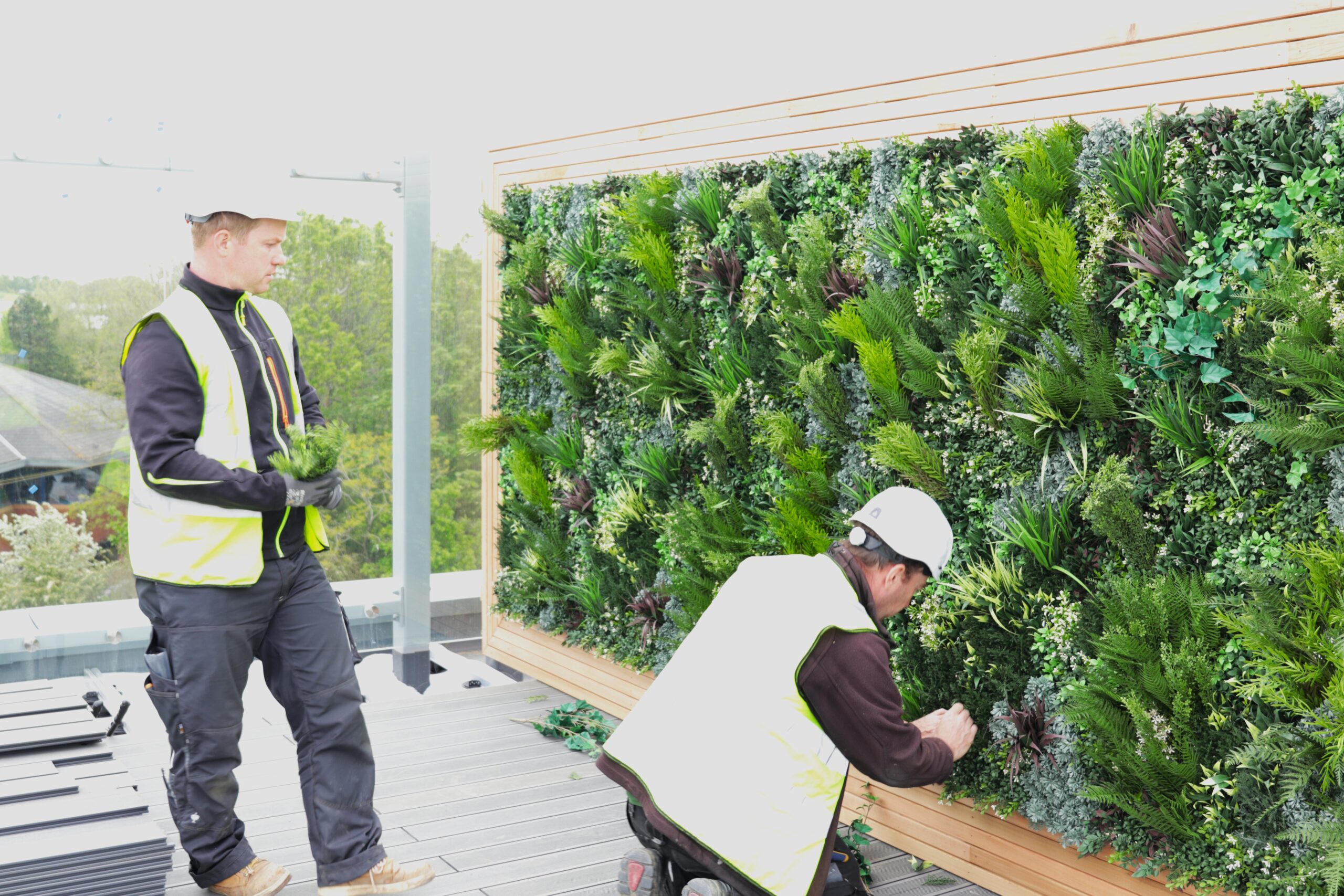 artificial green wall installations on a roof terrace